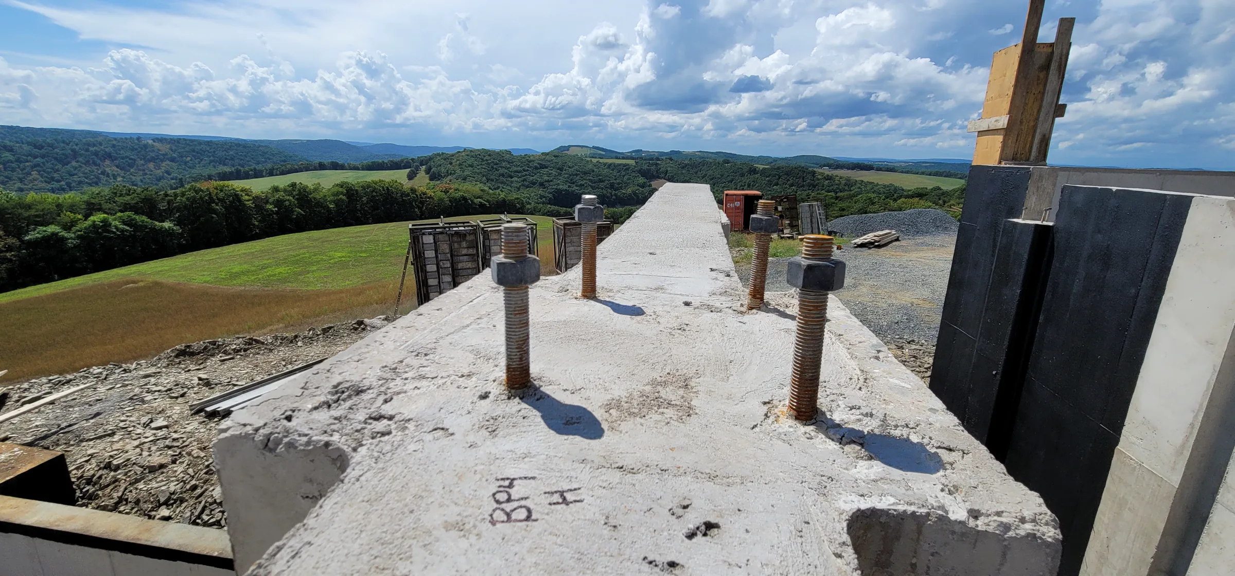 Foundation walls and slab of the Modern Mountain House opening toward the Pennsylvania valley