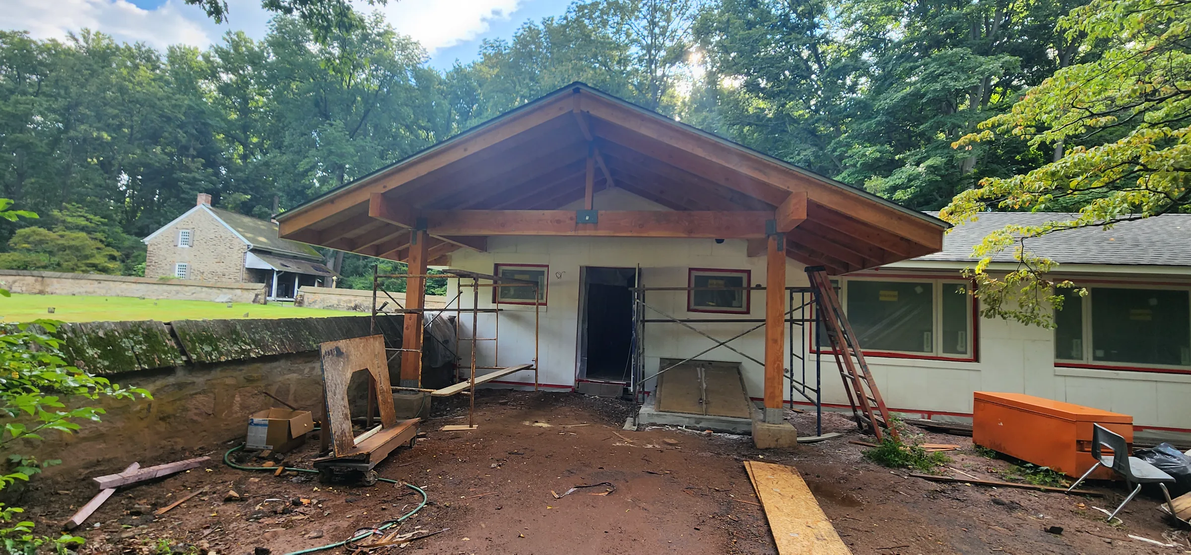 Timber-framed covered entrance at Friends First School during enclosure work