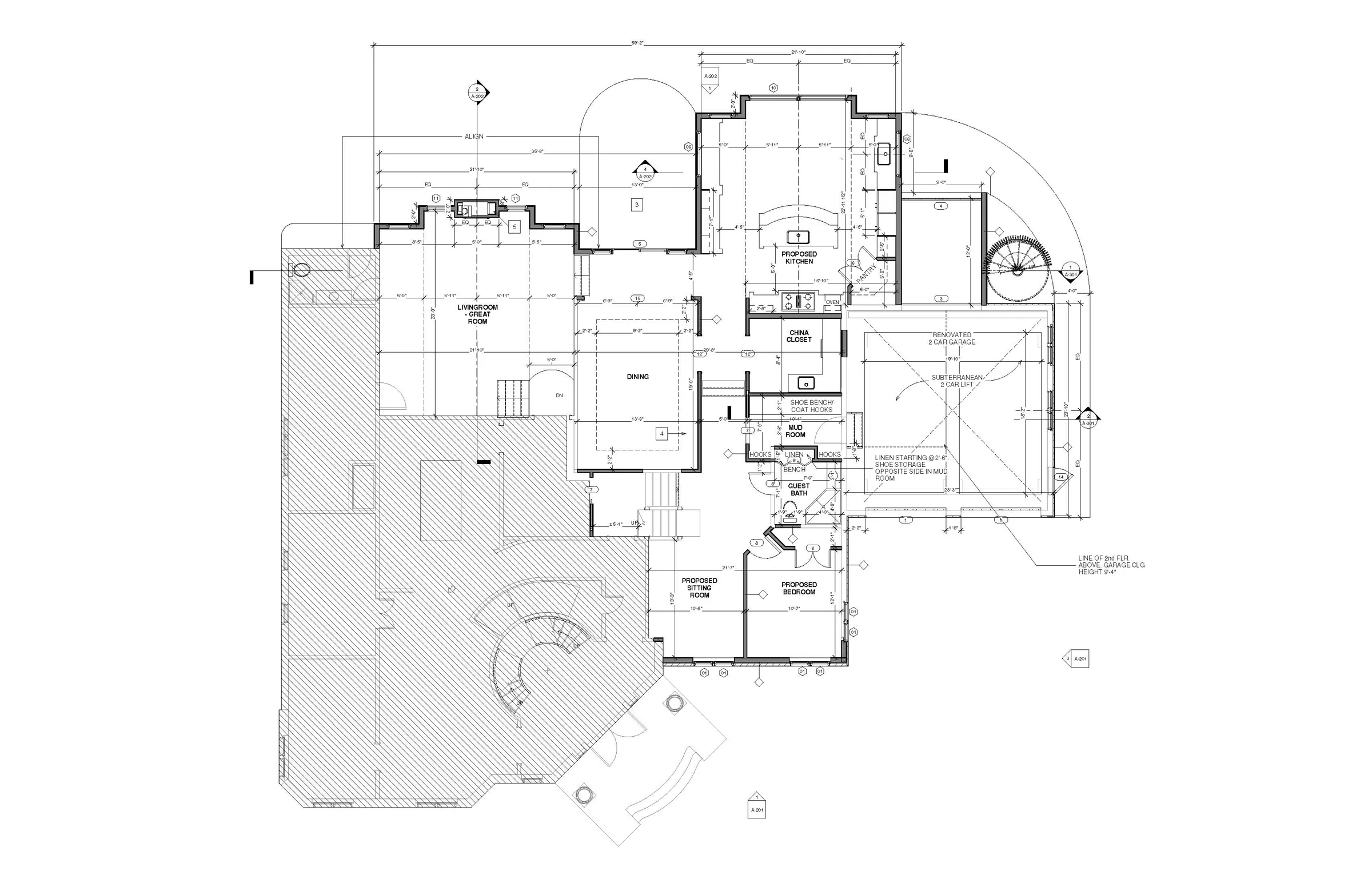 Line-drawn ground-floor plan with the living room, dining room, kitchen, mud room, guest bath, and a renovated two-car garage, a curved terrace hatched at lower left